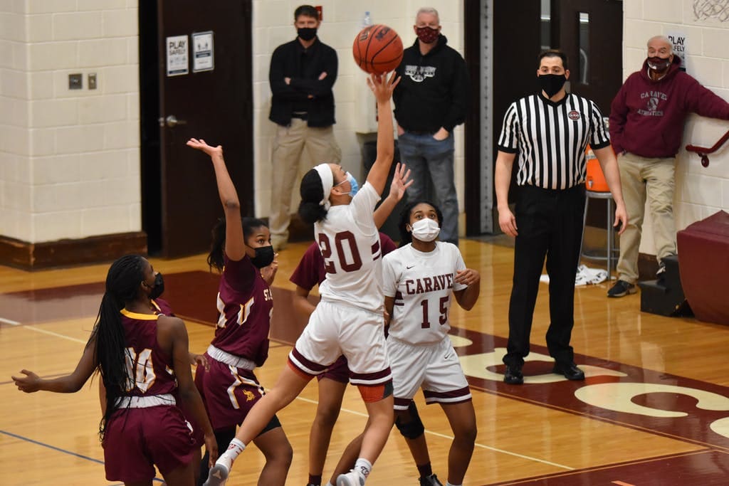 All eyes on India Johnston of Caravel as she releases a shot.