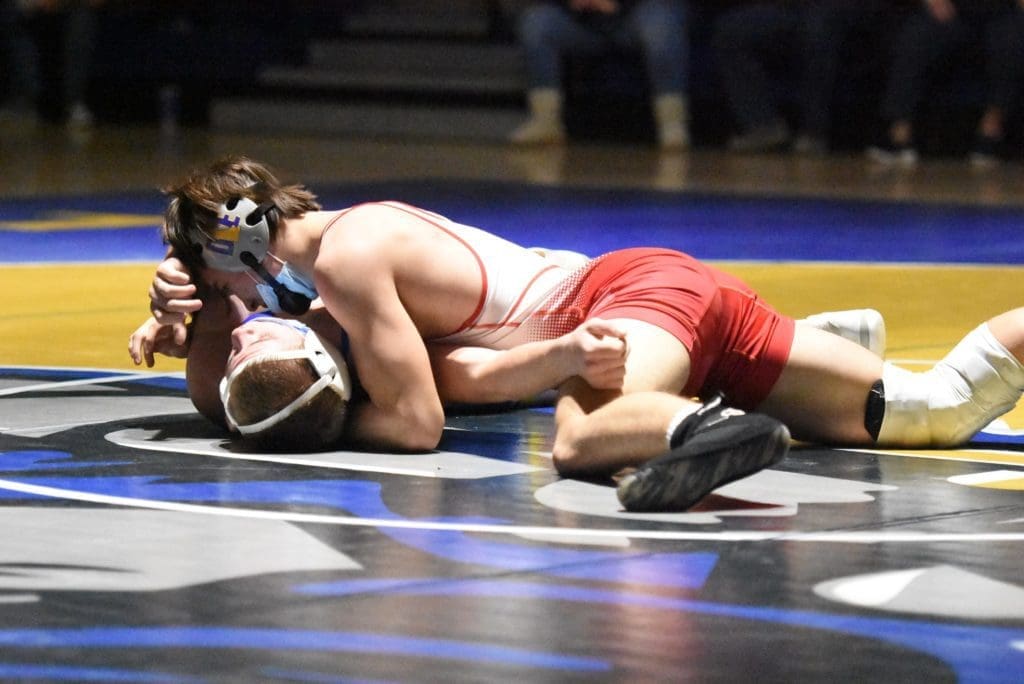 Brandon West 160lb Smyrna gets the Pin against Sussex Central photo by Ben Fulton BF Imagery