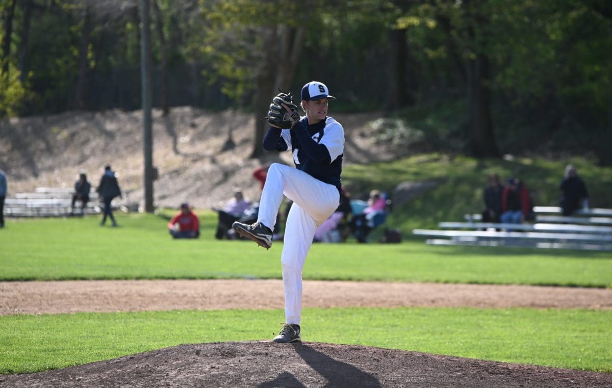 Zach Czarnecki of Salesianum winding up to throw a pitch in the win over Conrad photo by Nick Halliday 1