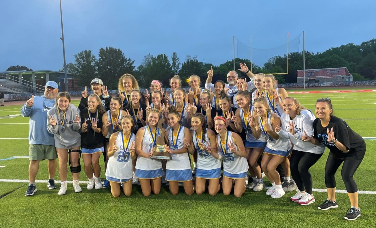 Cape Henlopen Girls Lacrosse posing after winning the thirteenth striaght state championship photo by Nick Halliday 1