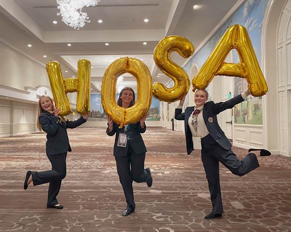 From left, Emily McCullough, Carrie Waegale, Zoe Peters at this year's HOSA-Future Health Professionals International Leadership Conference, where 15 Delaware students finished in the top 10 in various competitions.