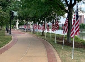 Rotary Club flags line the Wilmington Riverwalk