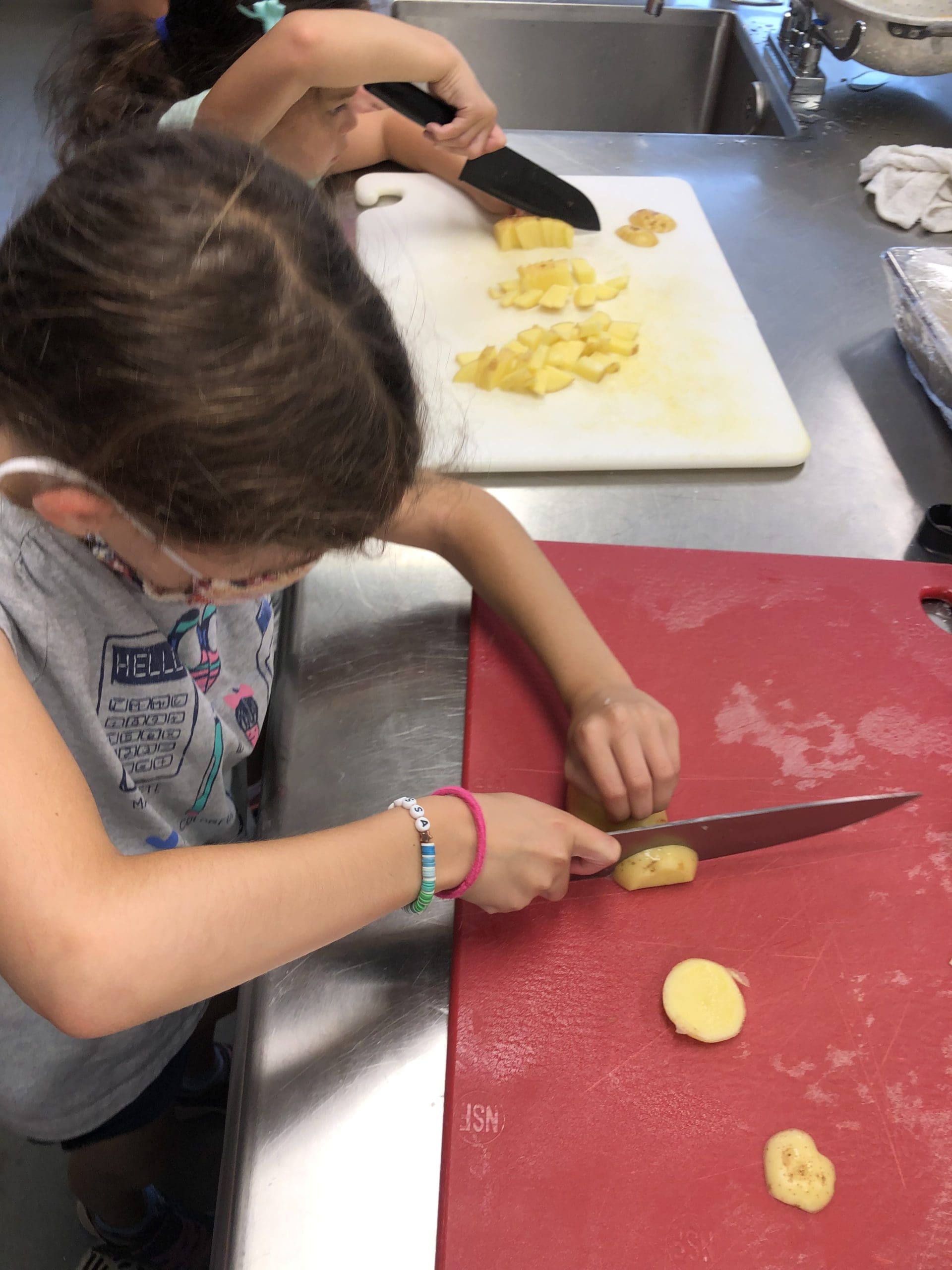 Children in the culinary camp learned how to use equipment and practiced food and kitchen safety.