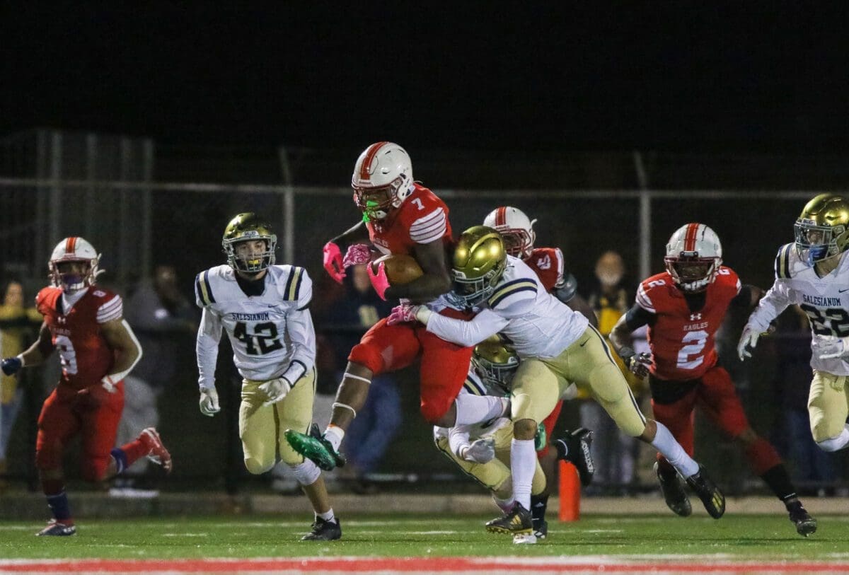 Smyrna Football running back Markell Hohlman rushes during the win over Salesianum photo by Donnell Henriquez
