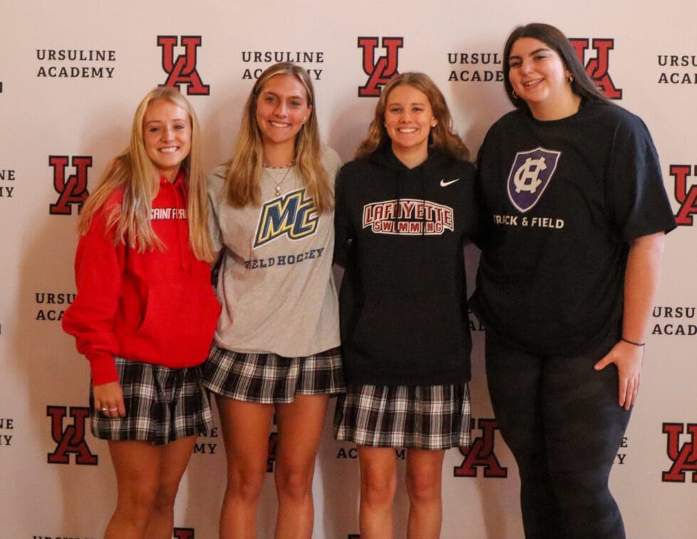 From left, Ursuline's Sophia Filipowski, Maddy Cherry, Natalie Johnson and Gabriella Paolella after signing their letters of intent to continue their athletic careers at the collegiate level. (Jarek Rutz/Delaware LIVE News)