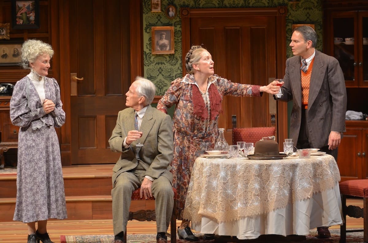 Mr. Gibbs (Allan Carlsen) and Mortimer (Mic Matarrese) are ready to down glasses of poisoned elderberry wine, until sisters Martha ( Elizabeth Heflin, left) and Abby (Kathleen Pirkl Tague) intervene. In UD REP’s “Arsenic and Old Lace.”