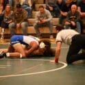 Caesar Rodney wrestler Trevor Copes pins his opponent during the win over Saint Marks photo by Nick Halliday