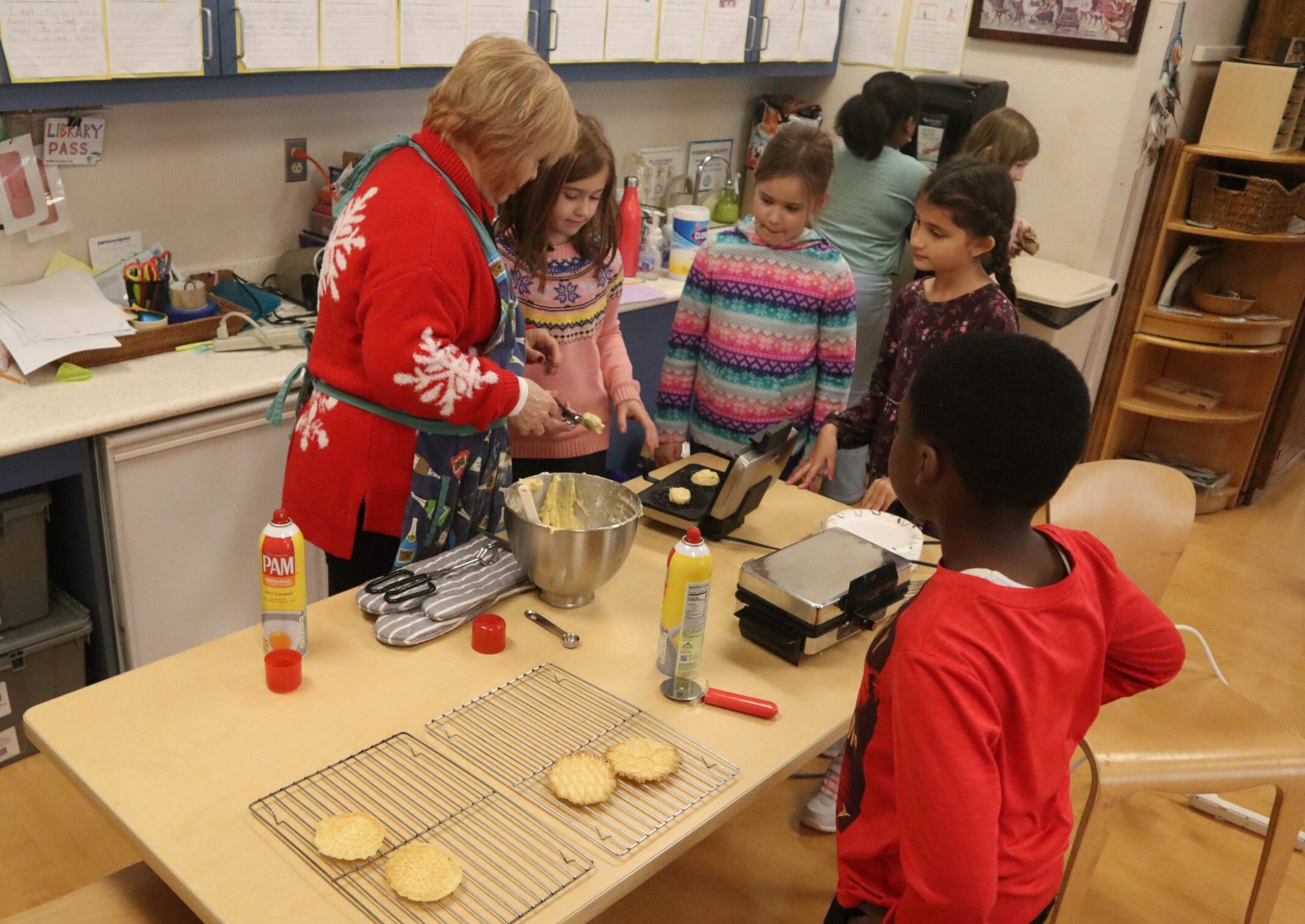 Some of First State Montessori's second- and third-graders made Italian pizzelles to eat and donate to a Downtown Visions. (Jarek Rutz/Delaware LIVE News)