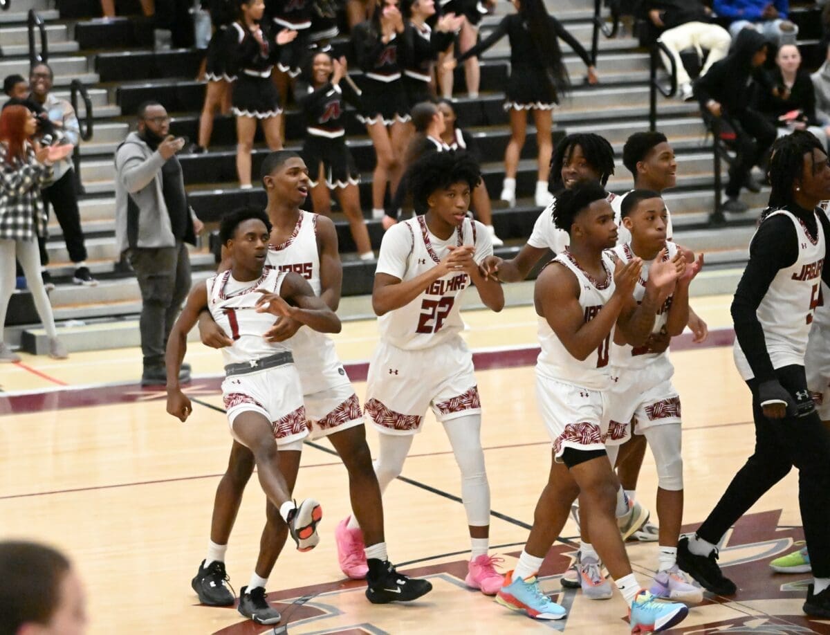 Appoquinimink basketball team celebrates after Haji Bell 1 hit a buzzer beater to force overtime photo by Nick Halliday 1