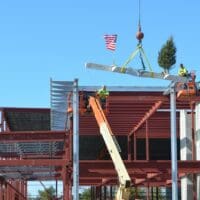 Food Bank celebrates topping off new Milford building