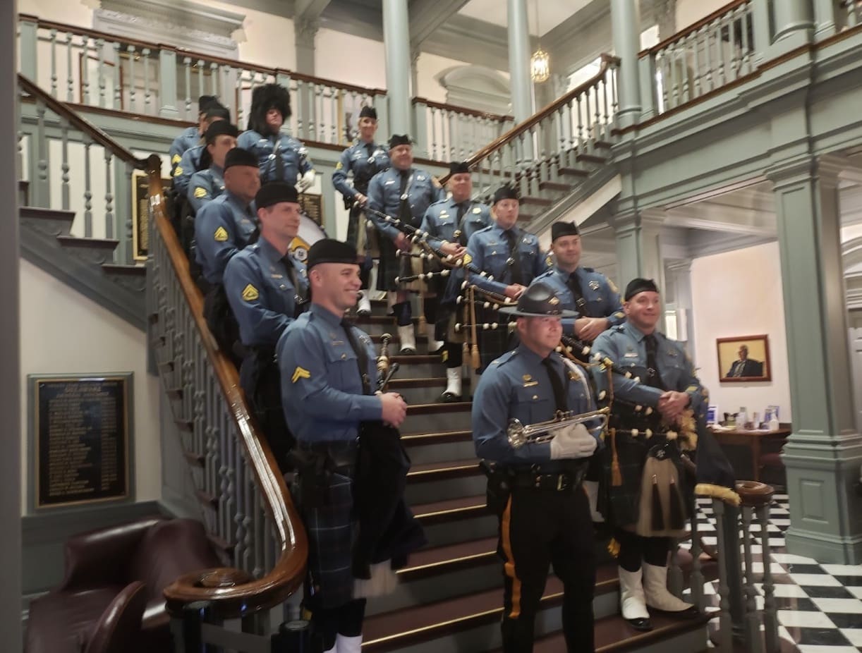 The bagpipers played "The Star-Spangled Banner" to memorialize members of Delaware State Police who died in the line of duty. (Sam Haut)