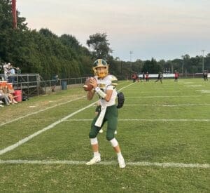 Saint Marks quarterback James Campbell warms up before a game photo by Nick Halliday