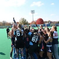 Delmar field hockey team celebrates being handed the championship trophy, photo couresy of Nick Halliday