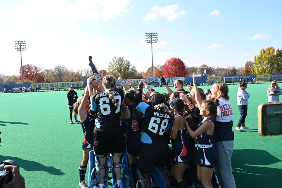 Delmar field hockey team celebrates being handed the championship trophy photo couresy of Nick Halliday