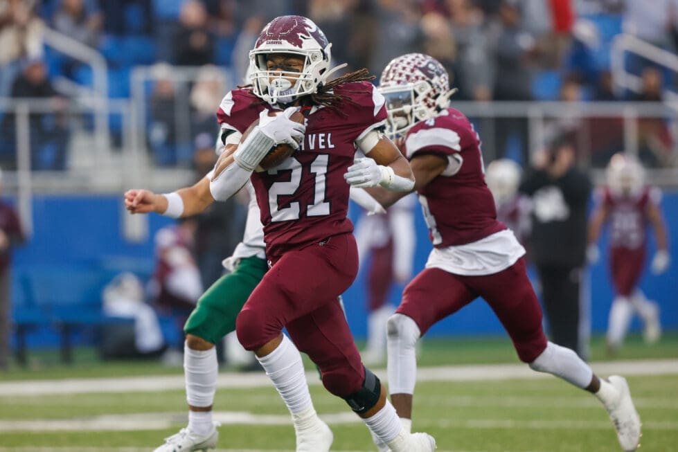 Caravel football Craig Miller runs the ball against Archmere in the DIAA 2A football state championship photo courtesy of Donnell Henriquez 1