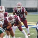Caravel football Jordan Miller in formation and set against Archmere in the DIAA 2A football state championship photo courtesy of Donnell Henriquez