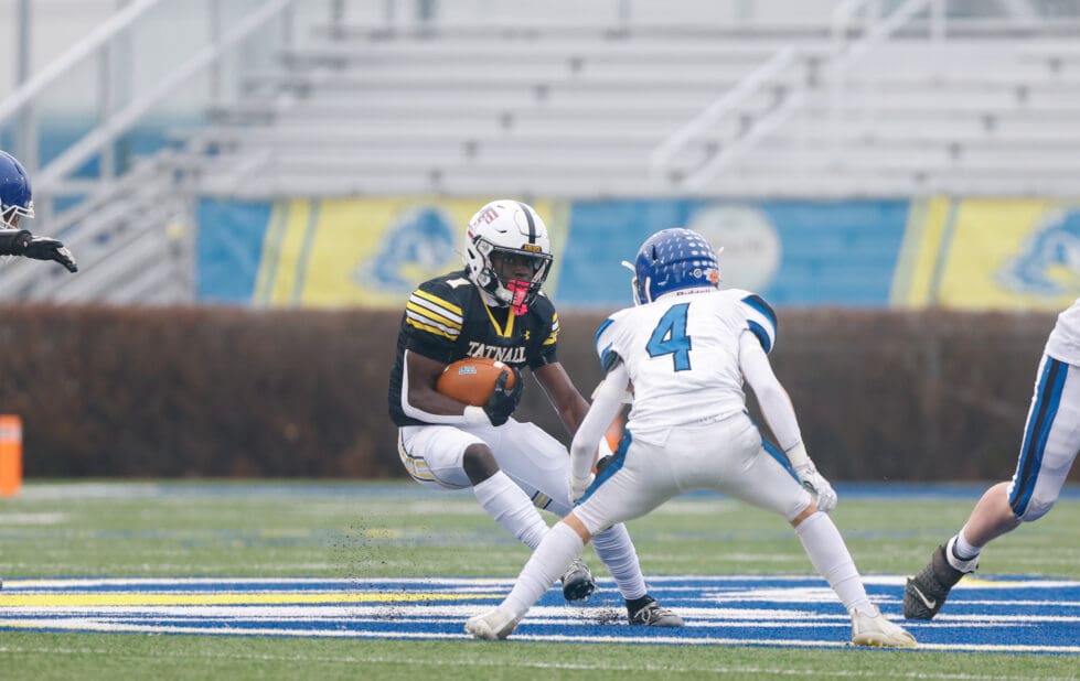 Tatnall football Micah Stamper runs the ball against Chater in the state championship