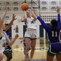 Archmere girls basketball Bridget Mallot attempts a shot during a game, photo courtesy of Mike Lang of the Dialog