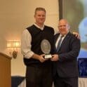 Class 3A coach of year Mike Frederick from Cape Henlopen holding his award with DIFCA president John Wilson photo courtesy of Glenn Frazer