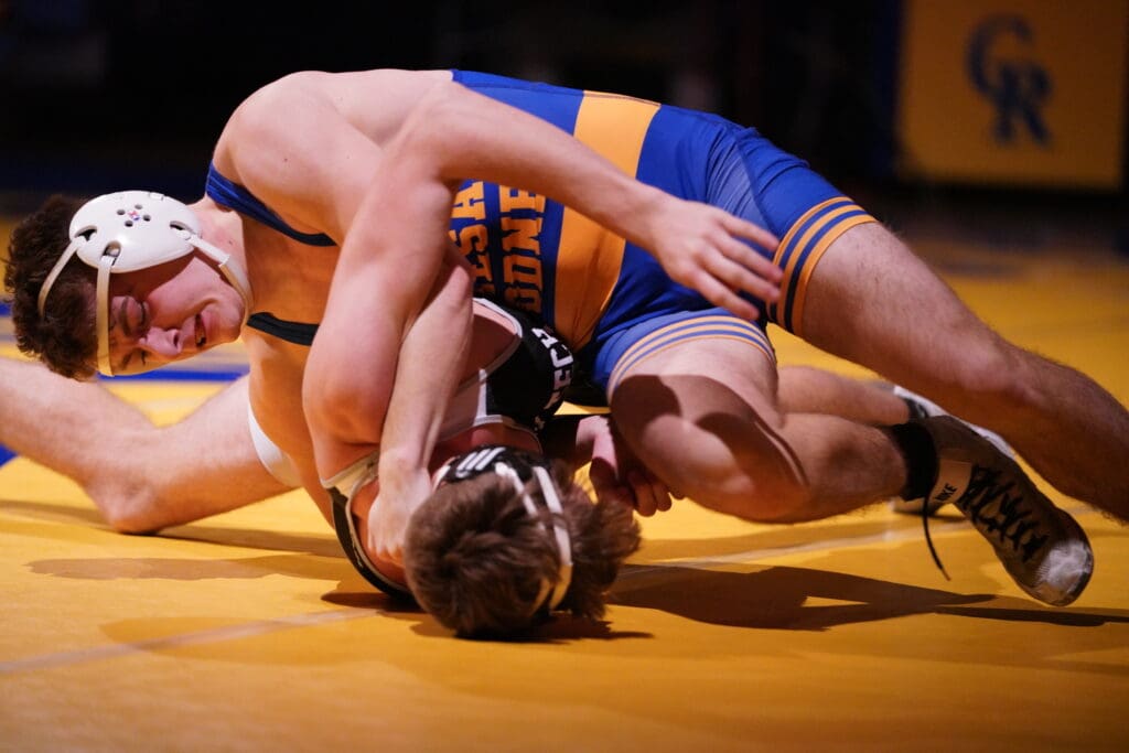 Logan Heffington of Caesar Rodney top turns Christian Hedges of Sussex Tech during their 175 pound bout. Heffington won by pin photo courtesy of Donato