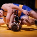 Logan Heffington of Caesar Rodney top turns Christian Hedges of Sussex Tech during their 175 pound bout. Heffington won by pin photo courtesy of Donato