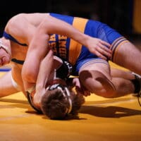 Logan Heffington of Caesar Rodney (top) turns Christian Hedges of Sussex Tech during their 175 pound bout. Heffington won by pin, photo courtesy of Donato