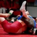 Walter Toomer of Caesar Rodney locks up a cradle on Smyrnas Mason Schulenburg during their 215 pound match. Toomer won with a pin in 305 photo courtesy of Eric Donato