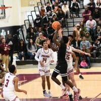 Middletown basketball Zion Mifflin attempts a shot in the triple overtime win over Appo, photo courtesy of Nick Halliday
