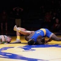 Walter Toomer of Caesar Rodney gets a pin in his 215 pound match in 430. The pin gave the Riders a dramatic 33-31 win, photo courtesy of Eric Donato