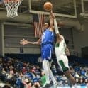 Delaware Blue Coats Terquavion Smith is fouled trying to dunk the basketball against the Maine Celtics photo courtesy of Ben Fulton