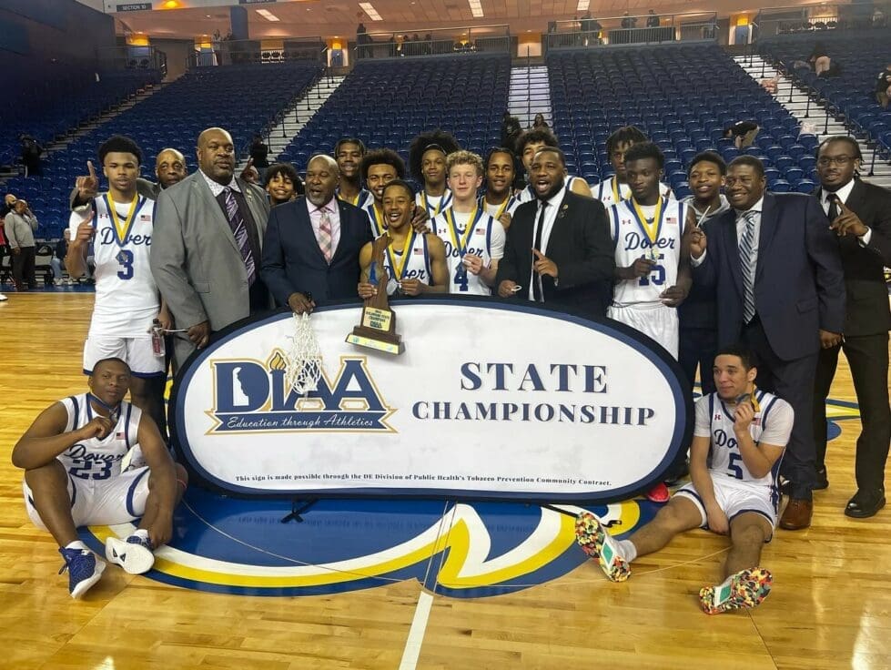 Dover boys basketball team poses after winning the DIAA boys basketball state championship photo courtesy of Dover High Facebook