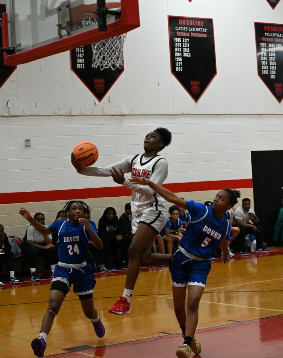 Ursuline girls basketball Jezelle GG Banks attempts a layup against Dover as she scored 32 points in the game photo courtesy of Nick Halliday