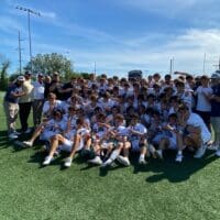 Salesianum boys lacrosse poses with the state championship trophy after winning their fourth straight. Photo courtesy of Mike Lang