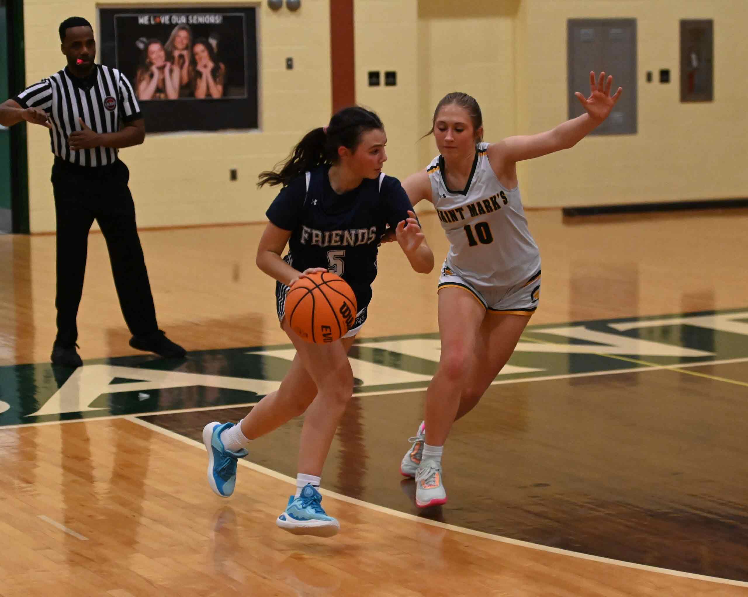 Featured image for “Ryan Wiegand leads Lady Quakers in 46-34 win over Spartans ”