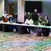 Redding Consortium Board members around U-shaped meeting table